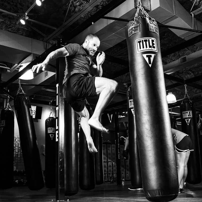 Mixed Martial Arts Lessons for Adults in Norwood NJ - Flying Knee Black and White MMA